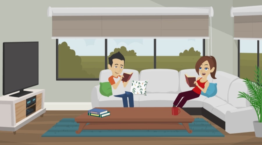 V obyvacím pokoji muž a žena sedí společně na gauči. Oba si vychutnávají klidné chvíle při čtení svých oblíbených knih. Žena sedí vpravo a muž vlevo.